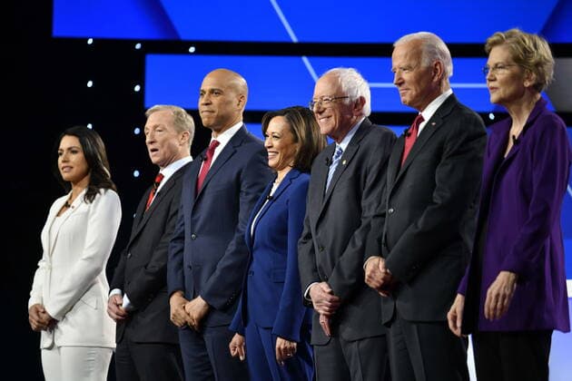 October 15, 2019, Westerville, Ohio, USA: (L-R) TULSI GABBARD, TOM STEYER, CORY BOOKER, KAMALA HARRIS, BERNIE SANDERS, JOE BIDEN, ELIZABETH WARREN, PETE BUTTIGIEG, ANDREW YANG, BETO O ROURKE, AMY KLOBUCHAR and JULIAN CASTRO on stage during the CNN and New York Times Democratic Presidential Debate, held at Otterbein University. Westerville USA  - ZUMA 20191015_mda_z03_626 Copyright: xEdwardxM.xPioRodax
