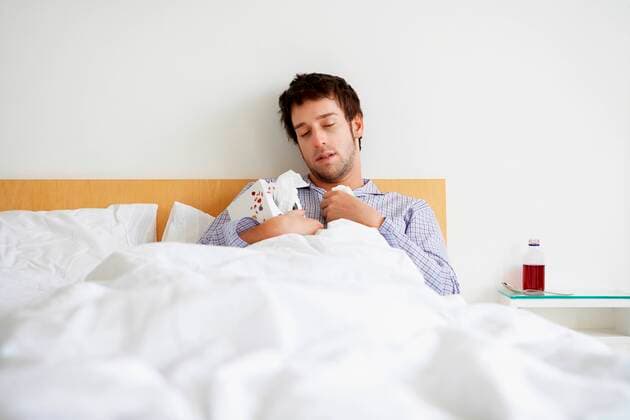 Man in Bed with a Cold,model released, Symbolfoto,property released 03B66046