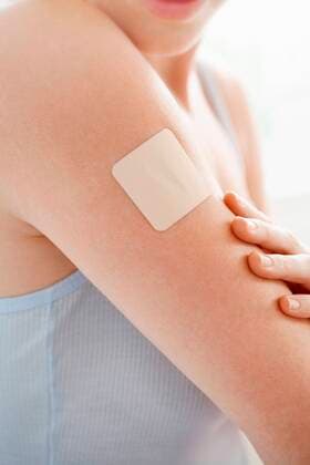 Woman with Patch on Arm,model released, Symbolfoto 03B66053