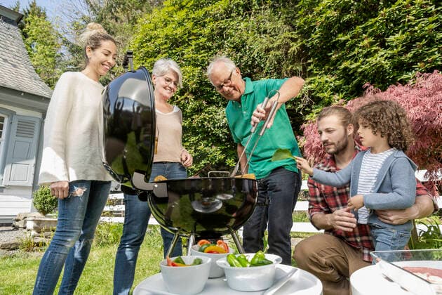 Extended family having a barbecue in garden model released Symbolfoto property released  MJFKF00143