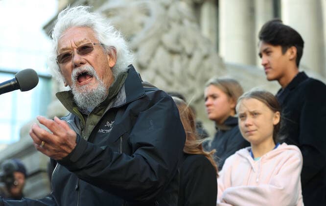 Swedish teen activist Greta Thunberg (pink) listens to David Suzuki speak after arriving for the post federal election Friday climate strike march starting and ending at the Vancouver Art Gallery in Vancouver, British Columbia on October 25, 2019. Organized by local youth-led, Sustainabiliteens, Greta and a turn out of nearly 10,000 climate activists demand action from industry and the various levels of government and are supporting the 15-youth who announced their plans to sue the federal government alleging it has contributed to climate change.  VAP2019102506 HEINZxRUCKEMANN