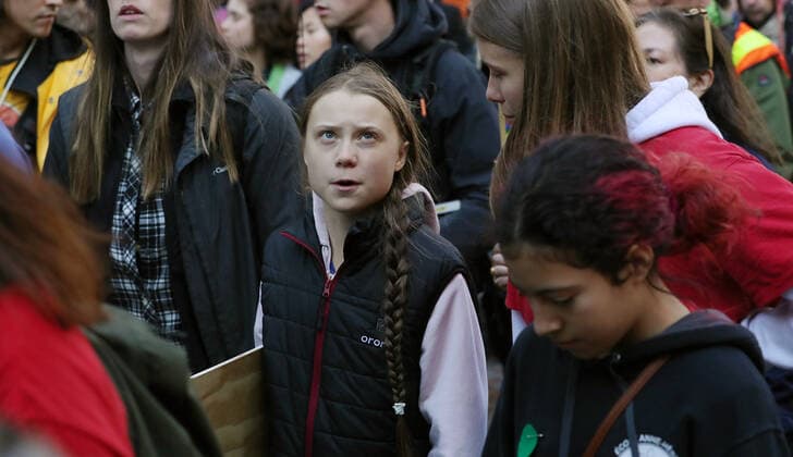 Swedish teen activist Greta Thunberg arrives for the post federal election Friday climate strike march starting and ending at the Vancouver Art Gallery in Vancouver, British Columbia on Friday, October 25, 2019. Organized by local youth-led, Sustainabiliteens, Greta and a turn out of nearly 10,000 climate activists demand action from industry and the various levels of government and are supporting the 15-youth who announced their plans to sue the federal government alleging it has contributed to climate change.  VAP2019102521 HEINZxRUCKEMANN