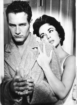 Paul Newman & Elizabeth Taylor Characters: Brick Pollitt & Margaret Maggie the Cat Pollitt Film: Cat On A Hot Tin Roof (USA 1958) Director: Richard Brooks 18 September 1958  Copyright: MaryxEvansxAFxArchive 12069603 editorial use only