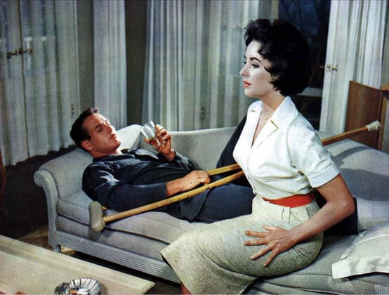 Elizabeth Taylor & Paul Newman Characters: Margaret Maggie the Cat Pollitt, Brick Pollitt Film: Cat On A Hot Tin Roof (USA 1958) Director: Richard Brooks 18 September 1958 CAT ON A HOT TIN ROOF US 1958 PAUL NEWMAN, ELIZABETH TAYLOR  Copyright: MaryxEvansxAFxArchive 12076497 editorial use only