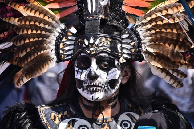 Mega Offering of Dia de Muertos in Mexico MEXICO CITY, MEXICO - NOVEMBER 1: A girl with the pre-Hispanic dress poses for photos during the mega offering as part of the Dia de Muertos celebration occasion to remember the dead at Zocalo. on November 1, 2019 in Mexico City, Mexico. This year s anniversary is very close to the 500th anniversary of a bloody event: October 18, 1519  Copyright: xCarlosxTischlerx EYE_3362