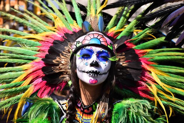 Mega Offering of Dia de Muertos in Mexico MEXICO CITY, MEXICO - NOVEMBER 1: A girl with the pre-Hispanic dress poses for photos during the mega offering as part of the Dia de Muertos celebration occasion to remember the dead at Zocalo. on November 1, 2019 in Mexico City, Mexico. This year s anniversary is very close to the 500th anniversary of a bloody event: October 18, 1519  Copyright: xCarlosxTischlerx EYE_3529