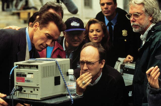 Arnold Schwarzenegger & Chuck Russell Characters: U.S. Marshal John The Eraser Kruger & Film: Eraser (1996) Director: Chuck Russell 21 June 1996  Copyright: MaryxEvansxAFxArchivexWarnerxBros 12563515 editorial use only