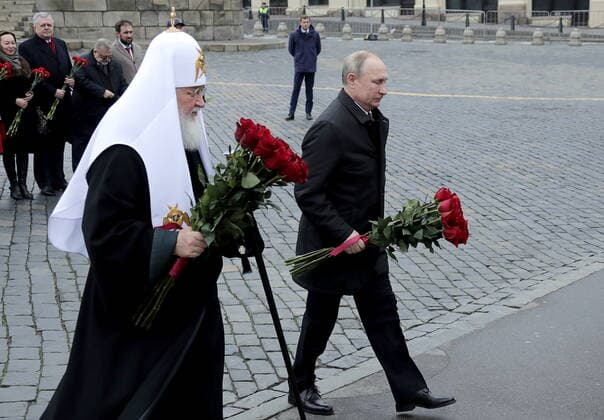 MOSCOW, RUSSIA - NOVEMBER 4, 2019: Patriarch Kirill (L) of Moscow and All Russia, and Russia s President Vladimir Putin attend a wreath laying ceremony at the monument to Prince Dmitry Pozharsky and merchant Kuzma Minin, Russian national heroes from the Time of Troubles, to mark National Unity Day annually celebrated in Russia on November 4. Mikhail Metzel TASS  TS0C1A99
