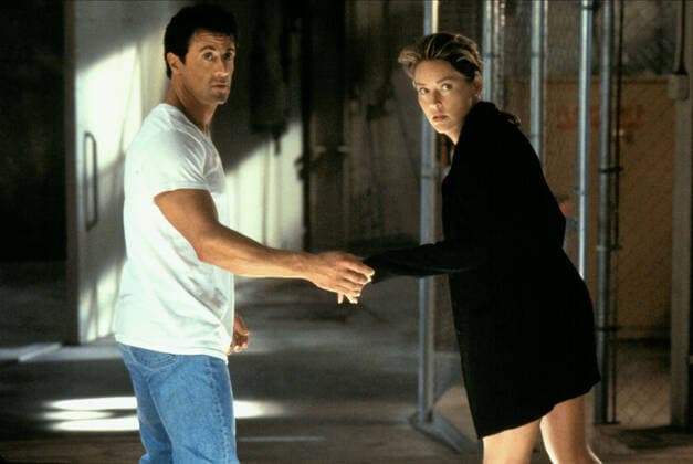 Sylvester Stallone & Sharon Stone Characters: Ray Quick, May Munro (aka Adrian Hastings) Film: The Specialist (1993) Director: Luis Llosa 07 October 1994  Copyright: MaryxEvansxAFxArchivexWarnerxBros 12585647 editorial use only