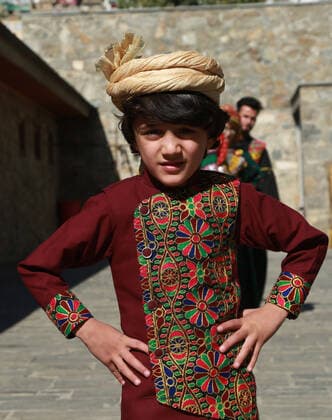 (191105) -- KABUL, Nov. 5, 2019 -- A child model poses for photos after presenting costumes of ethnic people in Afghanistan during a fashion show in Kabul, capital of Afghanistan, Nov. 4, 2019. (Photo by Xinhua) AFGHANISTAN-KABUL-FASHION SHOW RahmatullahxAlizadah 