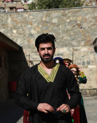 (191105) -- KABUL, Nov. 5, 2019 -- A model poses for photos after presenting costumes of ethnic people in Afghanistan during a fashion show in Kabul, capital of Afghanistan, Nov. 4, 2019. (Photo by Xinhua) AFGHANISTAN-KABUL-FASHION SHOW RahmatullahxAlizadah 
