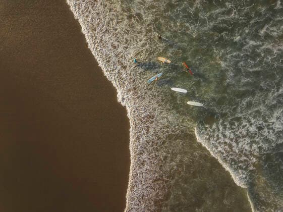 Aerial view of surfers at the beach Indonesia, Bali CR_KOTRIN191014C-220187-01