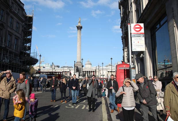 People observe the two-minute silence on Remembrance Sunday ceremony near Trafalgar Square. Remembrance Sunday, London, on November 10, 2019. 
