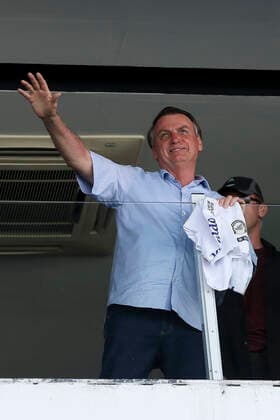 SANTOS, SP - 16.11.2019: SANTOS X SÃO PAULO FC - The President of the Republic, Jair Bolsonaro, during the match between Santos and São Paulo FC, valid for the 33rd round of the 2019 Brazilian Championship. The game is held at Vila Belmiro Stadium, located in Santos, SP. x1832378x  MarcoxGalvão