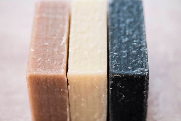 High angle close up of three bars of homemade bars of soap. High angle close up of three bars of homemade bars of soap.  59307