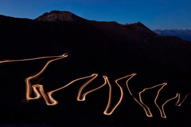 Pass road Stilfser Joch at night with light band of driving cars, long time exposure, South Tyrol, Italy, Europe Copyright: RudixSebastian 1294-110