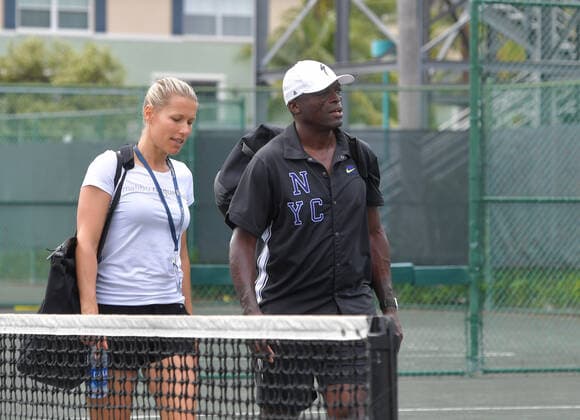 November 24, 2019, Delray Beach, Florida, United States Of America: DELRAY BEACH, FL - NOVEMBER 24: Seal and his new slovenija tennis pro girlfriend Tina Hojnik have a tender private moment on a side court after they participated in the 30TH Annual Chris Evert Pro-Celebrity Tennis Classic presented by Chase Private Client at Delray Beach Tennis Center on November 24, 2019 in Delray Beach, Florida..People: Seal, Tina Hojnik Delray Beach United States Of America - ZUMAn287 20191124_zaa_n287_172 Copyright: xSMGx