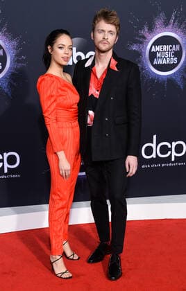 (L-R) YouTuber Claudia Sulewski and singer Finneas O Connell arrive for the 47th annual American Music Awards at the Microsoft Theater in Los Angeles on Sunday, November 24, 2019.  LAP20191124413 JIMxRUYMEN