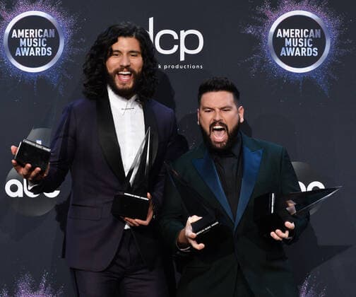 (L-R) Dan Smyers and Shay Mooney of Dan + Shay appear backstage with their awards for Favorite Song - Country for Speechless and Favorite Duo or Group ? Country, during the 47th annual American Music Awards at the Microsoft Theater in Los Angeles on Sunday, November 24, 2019.  LAP20191124443 JIMxRUYMEN