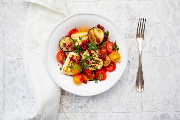 Directly below shot of salad in plate by fork on floor  LVF08240