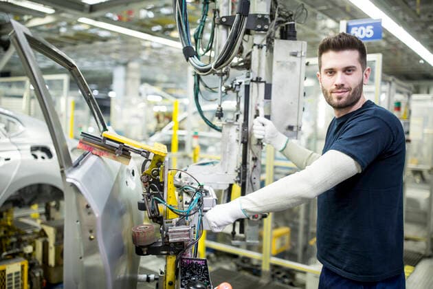 Portrait of confident worker in modern car factory model released Symbolfoto property released WESTF24334