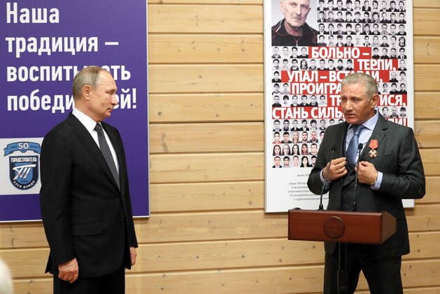 ST PETERSBURG, RUSSIA - NOVEMBER 27, 2019: Russia s President Vladimir Putin (L) and Boris Rotenberg, co-owner and a member of the Board of Directors at SMP Bank, awarded the Alexander Nevsky order, during a ceremony to present state awards at the Turbostroitel judo club. Mikhail Tereshchenko TASS  TS0C502E
