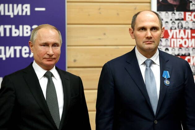 ST PETERSBURG, RUSSIA - NOVEMBER 27, 2019: Russia s President Vladimir Putin (L) and Mikhail Rakhlin, president of the Turbostroitel judo club, awarded the Order of Honor, during a ceremony to present state awards at the Turbostroitel judo club. Mikhail Tereshchenko TASS  TS0C503C