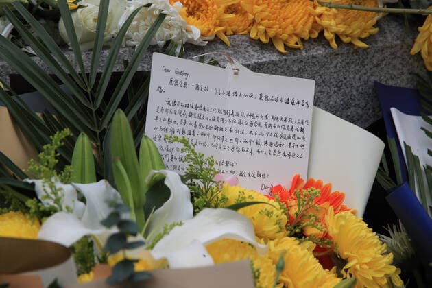 Fans donate floral wreath at the Chase Me filming site where Taiwanese-Canadian model and actor Godfrey Gao had a cardiac arrest in in Ningbo city, east China s Zhejiang province, 29 November 2019. Godfrey Gao, Taiwanese-Canadian model and actor, and first Asian model to be signed on by luxury brand Louis Vuitton, had heart attack while filming for Chase Me , a Chinese city-and-sport-themed reality show broadcast by Zhejiang Television. Godfrey Gao passed away after hours of rescue in Ningbo city, east China s Zhejiang province, 27 November 2019. Fans gather at filming site to mourn for the death of Godfrey Gao in China  811329505677803730