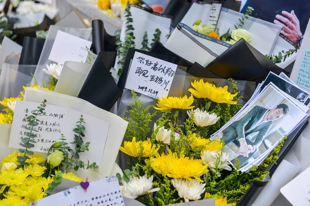 Fans lay individual wreathes and flowers at the recording scene in memorial of Godfrey Gao, a Taiwanese-Canadian model and actor, who died during the shooting of Zhejiang Television s reality show Chase Me, in Ningbo city, east China s Zhejiang province, 29 November 2019.