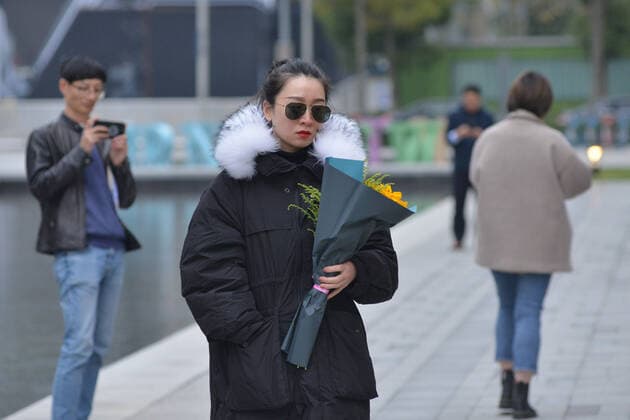 Fans lay individual wreathes and flowers at the recording scene in memorial of Godfrey Gao, a Taiwanese-Canadian model and actor, who died during the shooting of Zhejiang Television s reality show Chase Me, in Ningbo city, east China s Zhejiang province, 29 November 2019.