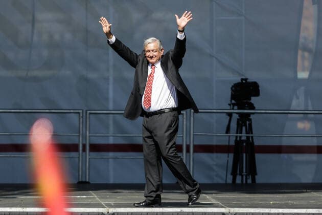 (191202) -- MEXICO CITY, Dec. 2, 2019 -- Mexican President Andres Manuel Lopez Obrador greets his supporters during a ceremony marking his first full year in office in Mexico City, capital of Mexico, on Dec. 1, 2019. Decreasing Mexico s high rates of violent crime is the government s main challenge, President Andres Manuel Lopez Obrador said on Sunday. (Photo by Xinhua) MEXICO-MEXICO CITY-PRESIDENT-CEREMONY FranciscoxCanedo 