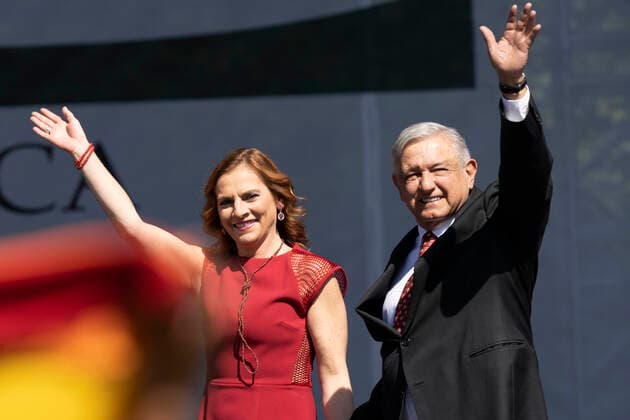 (191202) -- MEXICO CITY, Dec. 2, 2019 -- Mexican President Andres Manuel Lopez Obrador (R) greets his supporters accompanied by his wife Beatriz Gutierrez Muller during a ceremony marking his first full year in office in Mexico City, capital of Mexico, on Dec. 1, 2019. Decreasing Mexico s high rates of violent crime is the government s main challenge, President Andres Manuel Lopez Obrador said on Sunday. (Photo by Xinhua) MEXICO-MEXICO CITY-PRESIDENT-CEREMONY DavidxdexlaxPaz 