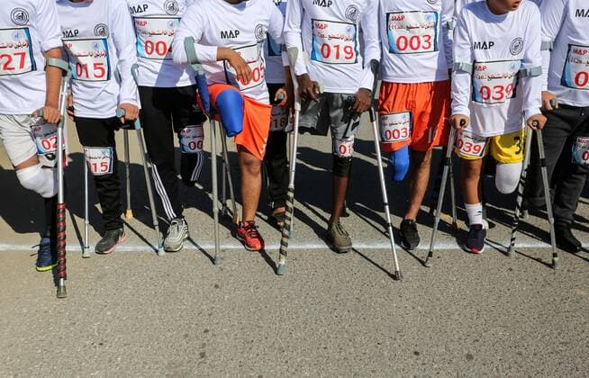 Bilder des Jahres 2019, News 12 Dezember News Bilder des Tages December 5, 2019, Al-Nuseirat, Gaza Strip, Palestinian Territory: Palestinian amputees compete in a local run racing in Al-Nuseirat in the center of Gaza Strip, on December 5, 2019 Al-Nuseirat Palestinian Territory - ZUMAap3_ 20191205_zaf_ap3_063 Copyright: xAshrafxAmrax