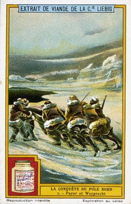 Pole Nord La conquete du Pole Nord : les explorateurs Payer et Weyprecht tirant une barque de la mer, chromo publicitaire Liebig vers 1910. Credit : Collection KHARBINE-TAPABOR.