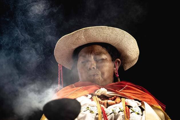 December 6, 2019, Madrid, Madrid, Spain: An Chilean indigenous activist celebrates a smoke ceremony at the end of a rally demanding climate change action during the 25th UN climate change conference taking place in Madrid. Madrid Spain - ZUMAo105 20191206_zap_o105_020 Copyright: xMatthiasxOesterlex