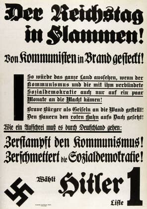 ALLEMAGNE 1933 Affiche electorale nazie de 1933 sur le theme du Reichstag incendie par les communistes. Credit : Coll. JeanVigne KHARBINE-TAPABOR.