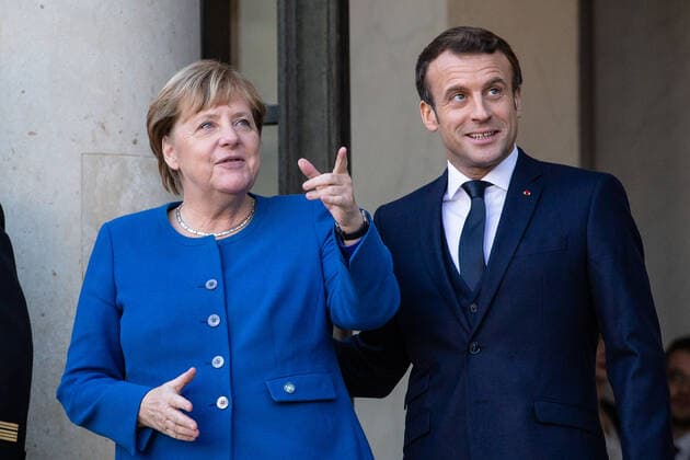 French President Emmanuel MACRON welcomes the Chancellor of the Federal Republic of Germany, Angela MERKEL, at the Elysee Palace, on December 9, 2019 in Paris, France. A summit in Normandy format to open a new sequence of implementation of the Minsk agreements.  Copyright: xAurelienxMorissardx