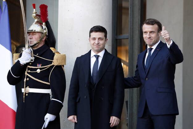 PARIS, FRANCE â€“ DECEMBER 9, 2019: Ukraine s President Volodymyr Zelenskyy (Vladimir Zelensky, C), and France s President Emmanuel Macron (R) at the Elysee Palace before a Normandy Four summit; talks in the so-called Normandy Four format involve representatives of Ukraine, Germany, France and Russia who discuss settlement of the conflict in eastern Ukraine. Grigory Dukor TASS  TS0C6AF0