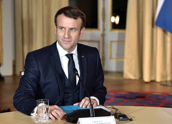 PARIS, FRANCE â€“ DECEMBER 9, 2019: France s President Emmanuel Macron attends a Normandy Four summit in the Murat Lounge in the Elysee Palace; talks in the so-called Normandy Four format involve representatives of Ukraine, Germany, France and Russia who discuss settlement of the conflict in eastern Ukraine. Alexei Nikolsky Russian Presidential Press and Information Office TASS  TS0C6B80
