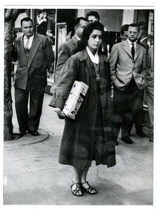 GUERRE D ALGERIE Guerre d ALGERIE: Djamila BOUPACHA (nee en 1938), apres son arrestation, lors de la reconstitution de l attentat du bar L Automatique a Alger. Ses tortures et viols seront rapportes dans un livre ecrit avec Simone de BEAUVOIR. Photographie anonyme vers 1957. Credit Collection Kharbine Tapabor *** WAR OF ALGERY War of ALGERY Djamila BOUPACHA born in 1938, after her arrest, during the reconstruction of the attack on the bar L Automatique in Algiers Her tortures and rapes will be reported in a book written with Simone de BEAUVOIR Anonymous photography around 1957 Credit Collection Kharbine Tapabor  KH88312