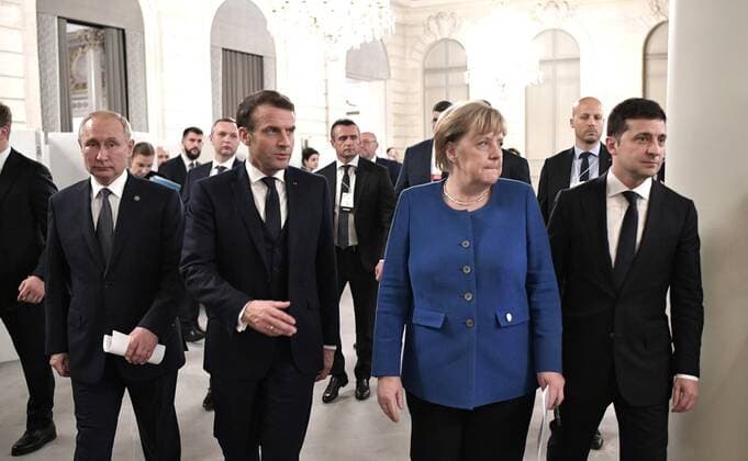 December 10, 2019. - France, Paris. - Russia s President Vladimir Putin, France s President Emmanuel Macron, Germany s Chancellor Angela Merkel, and Ukraine s President Volodymyr Zelensky (from L to R) before a news conference following a Normandy Four summit at the Elysee Palace. KremlinxPool 