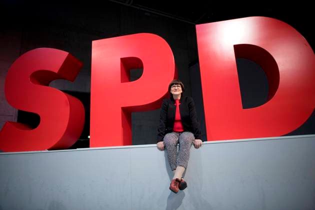 Saskia Esken, SPD DEU, Deutschland, Germany, Berlin, 08.12.2019 Saskia Esken, die neue Parteivorsitzende der SPD, vor dem Logo auf dem Parteitag der SPD unter dem Motto In Die Neue Zeit in Berlin. Portrait Saskia Esken, the new elected co-leader of the German Social Democrats SPD, in front of the Logo at the SPD federal party congress on December 8, 2019 in Berlin, Germany. SPD members nationwide voted for the pair and delegates are expected to confirm their election. Their election has raised concerns that, because the two pushed a markedly left-wing platform, the SPD might break from its governing coalition