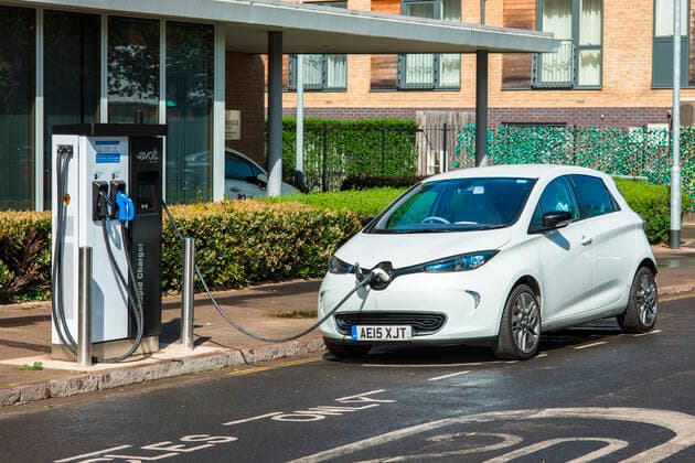 Electric car plugged into Evolt charge point in Cambridge, England, UK.  4042_01_am08184
