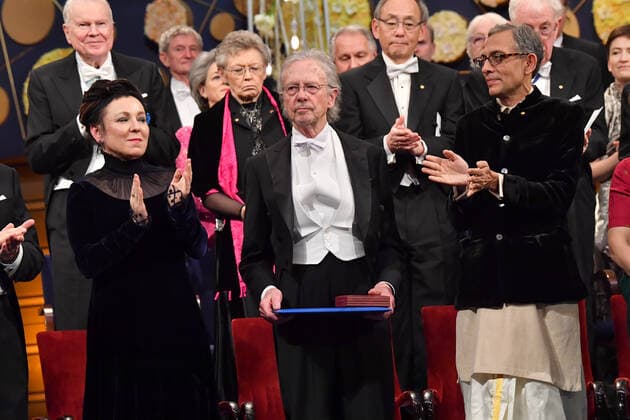 Austrian author Peter Handke C is applauded by literature laureate Olga Tokarczuk L and economics laureate Abhijit Banerjee R during the Nobel award ceremony at Stockholm Concert Hall, in Stockholm on Tuesday Dec 10, 2019 STOCKHOLM SWEDEN x10030x,  Copyright: xJonasxEkstromer TTx SWEDEN NOBEL