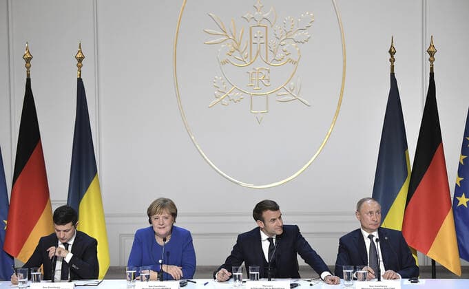 December 10, 2019, Paris, France: The leaders of Ukrainian, France, Russia and Germany together during a joint press conference following the conclusion of the Normandy Format Summit meeting at the Elysee Palace December 10, 2019 in Paris, France. From left to right are: Ukraine President Vladimir Zelensky, German Chancellor Angela Merkel, French President Emmanuel Macron and Russian President Vladimir Putin. Paris France - ZUMAp138 20191210_zaa_p138_006 Copyright: xAlexeixNikolsky KremlinxPoolx