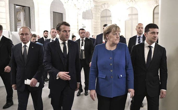 December 10, 2019, Paris, France: The leaders of Ukrainian, France, Russia and Germany walk together to a joint press conference following the conclusion of the Normandy Format Summit meeting at the Elysee Palace December 10, 2019 in Paris, France. From left to right are: Russian President Vladimir Putin, French President Emmanuel Macron, German Chancellor Angela Merkel and Ukraine President Vladimir Zelensky. Paris France - ZUMAp138 20191210_zaa_p138_002 Copyright: xAlexeixNikolsky KremlinxPoolx