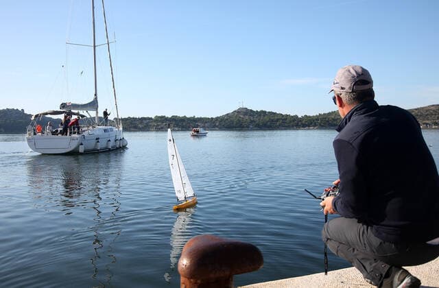 Regatta of radio-controlled sailboats - Sibenik, Croatia 15.12.2019., Sibenik, Croatia - The 24th regatta of radio-controlled sailboats finally started on the Sibenik waterfront in front of the cannons, which was delayed because there was no wind.  DuskoxJaramaz PIXSELL