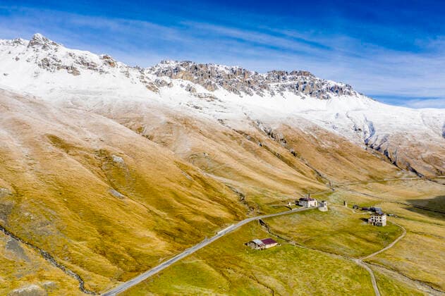 Aerial view by drone of Piz Umbrail and Punta di Rims in autumn, Braulio Valley, Bormio, Sondrio province, Valtellina, Lombardy, Italy, Europe Copyright: RobertoxMoiola 1179-4092