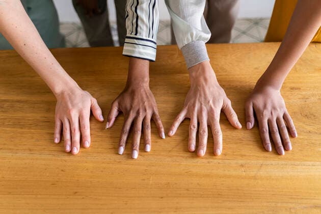 Close-up of hands of four women side by side model released Symbolfoto property released  AFVF04525
