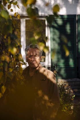 Portrait of a serious senior man at tree in garden model released Symbolfoto property released  GUSF03130